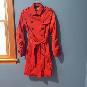 Medium orange double breasted trench coat